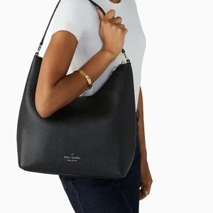 Kate Spade Zippy Shoulder Bag
COLOR:
Black